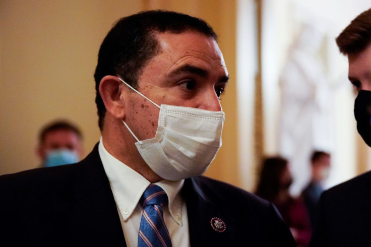 U.S. Representative Henry Cuellar (D-TX) stops to talk to reporters on his way to vote on the House floor at the U.S. Capitol in Washington, U.S., November 4, 2021. 