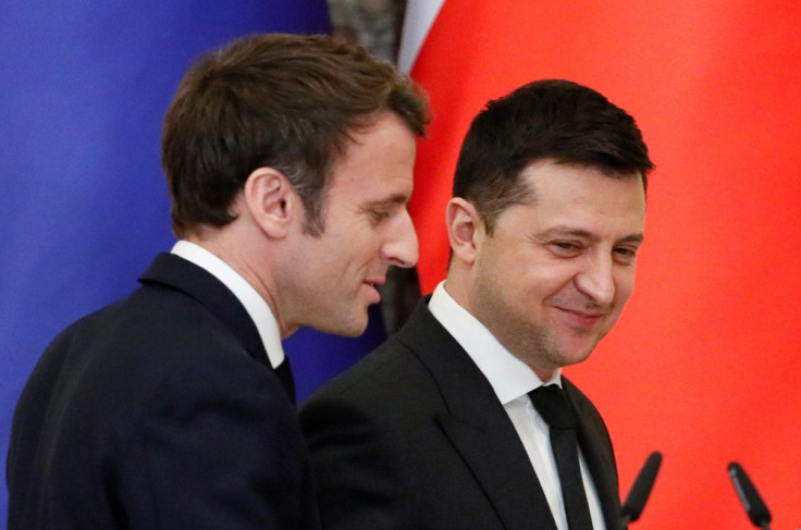 Ukrainian President Volodymyr Zelenskiy and French President Emmanuel Macron attend a news briefing following their talks in Kyiv, Ukraine February 8, 2022. 