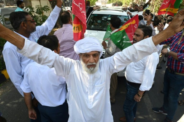 Activists of the Pakistan Tehreek-e-Insaf (PTI) party of ousted prime minister Imran Khan chant slogans during a protest