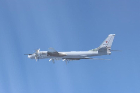 A Russian TU-95 bomber flies over East China Sea in this handout picture taken by Japan Air Self-Defence Force and released by the Joint Staff Office of the Defense Ministry of Japan May 24, 2022. Joint Staff Office of the Defense Ministry of Japan/HANDOU