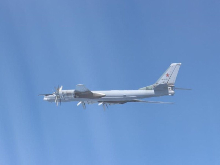 A Russian TU-95 bomber flies over East China Sea in this handout picture taken by Japan Air Self-Defence Force and released by the Joint Staff Office of the Defense Ministry of Japan May 24, 2022. Joint Staff Office of the Defense Ministry of Japan/HANDOU