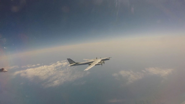 Russian Tu-95 strategic bomber flies during Russian-Chinese military aerial exercises to patrol the Asia-Pacific region, at an unidentified location, in this still image taken from a video released May 24, 2022. Russian Defence Ministry/Handout via REUTER