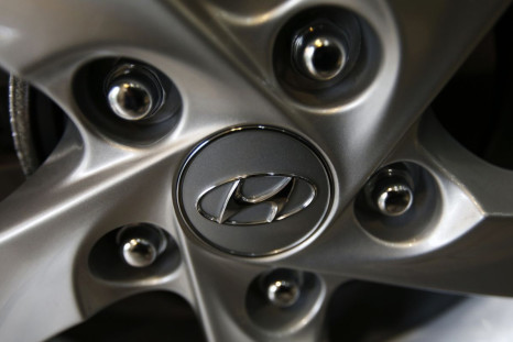 The logo of Hyundai Motor Co. is seen on a wheel of a car at a Hyundai dealership in Seoul January 22, 2015. 