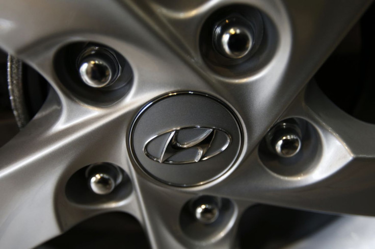 The logo of Hyundai Motor Co. is seen on a wheel of a car at a Hyundai dealership in Seoul January 22, 2015. 