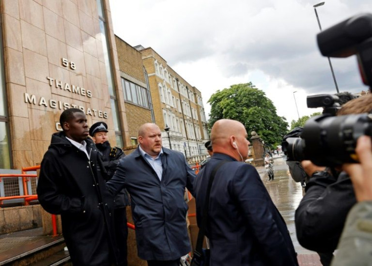 West Ham defender Kurt Zouma (left) leaves Thames Magistrates' Court in London