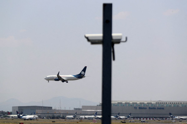 An AeroMexico airplane prepares to land on the airstrip at Benito Juarez international airport in Mexico City, Mexico, May 9, 2022.