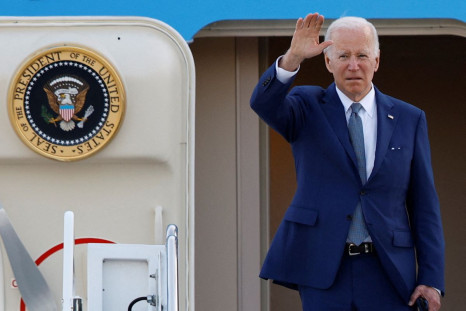 U.S. President Joe Biden gestures as he boards Air Force One to depart from Yokota Air Base in Fussa, on the outskirts of Tokyo, Japan May 24, 2022. 