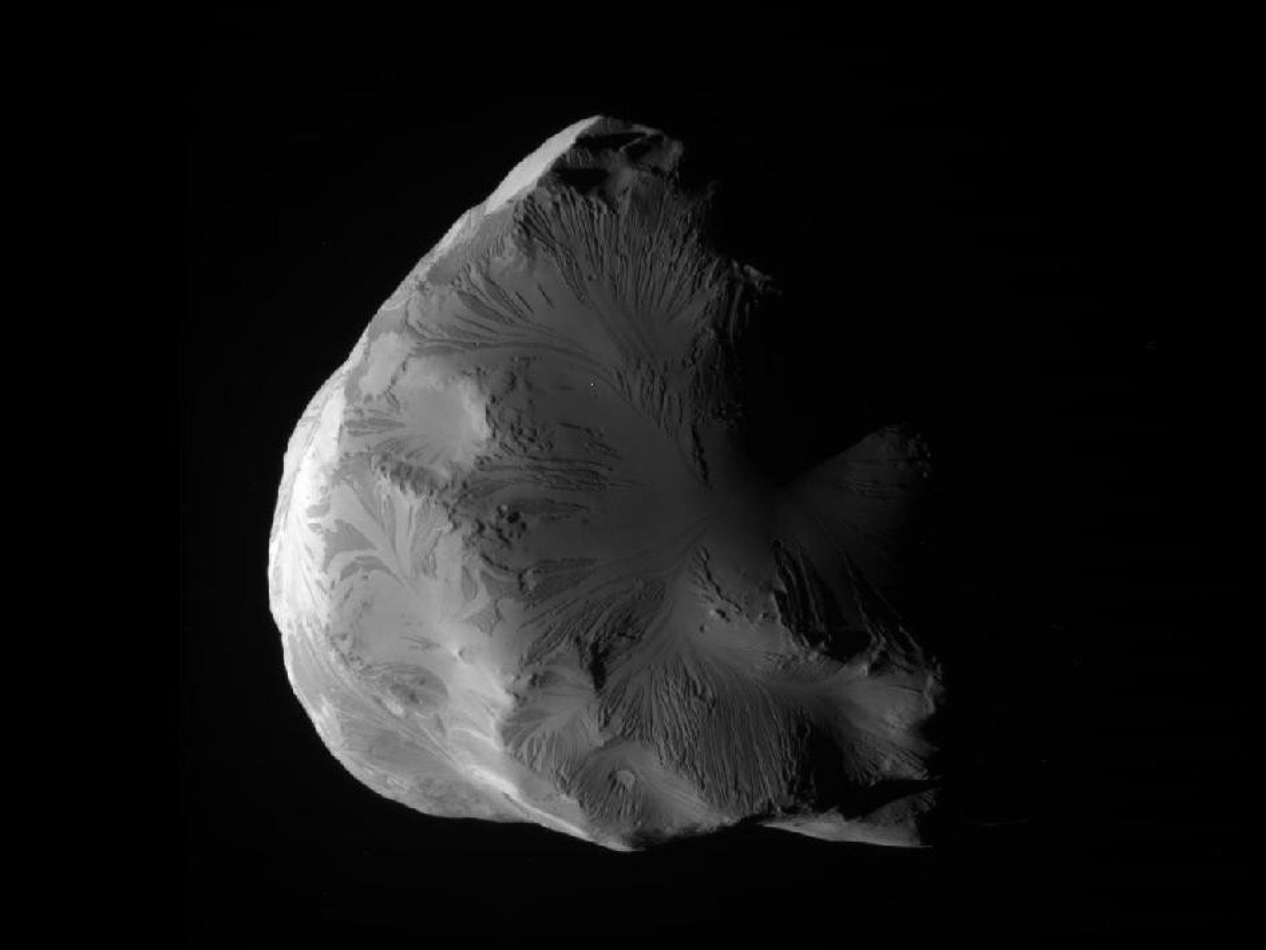 NASA039s Cassini spacecraft obtained this unprocessed image of Saturn039s moon Helene on June 18, 2011.
