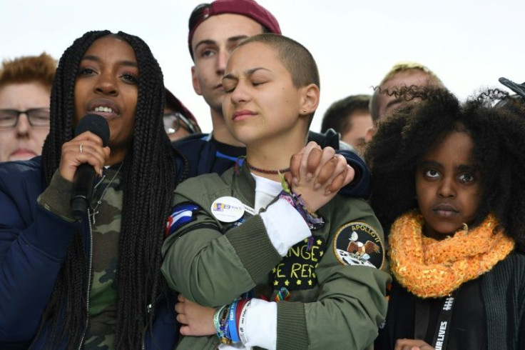 Marjory Stoneman Douglas High School student Emma Gonzalez (C) and her classmates speak during the March for Our Lives rally in Washington on March 24, 2018