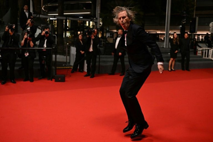 Director Brett Morgen brought a one-man party to the red carpet with some wild dance moves
