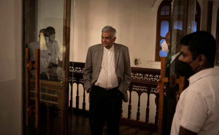 Sri Lanka's Prime Minister Ranil Wickremesinghe arrives for an interview with Reuters at his office in Colombo, Sri Lanka, May 24, 2022. 