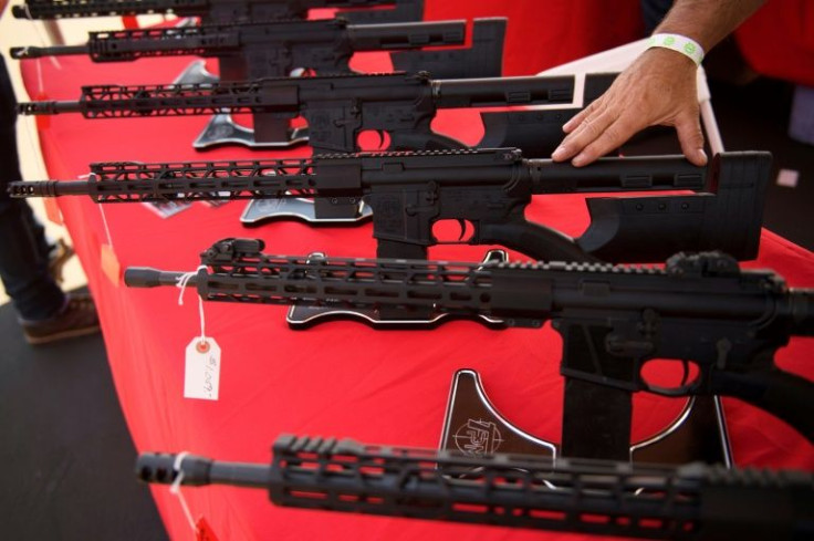 AR-15 style assault rifles on display at the Crossroads of the West Gun Show in Costa Mesa, California in 2021.