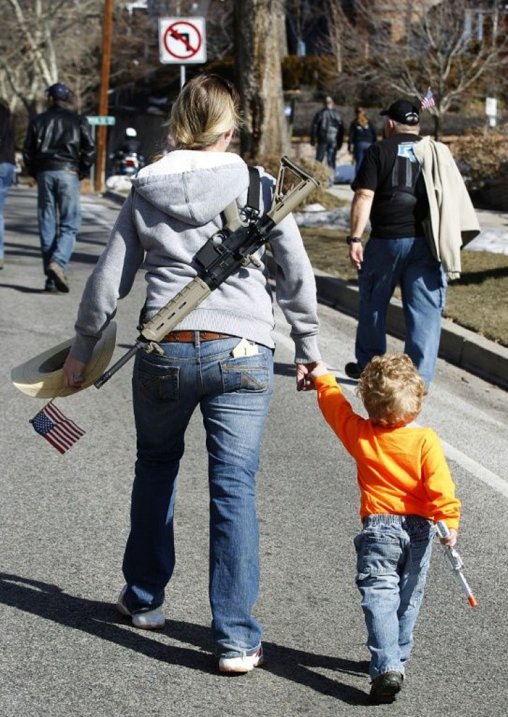 A woman and her child at a 2013 gun rights rally in Utah