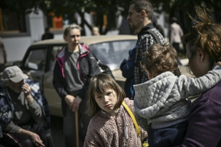 Some families fleeing Ukraine's eastern front have no set destination or idea what might happen to their homes