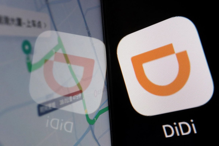 The app logo of Chinese ride-hailing giant Didi is seen reflected on its navigation map displayed on a mobile phone in this illustration picture taken July 1, 2021. 
