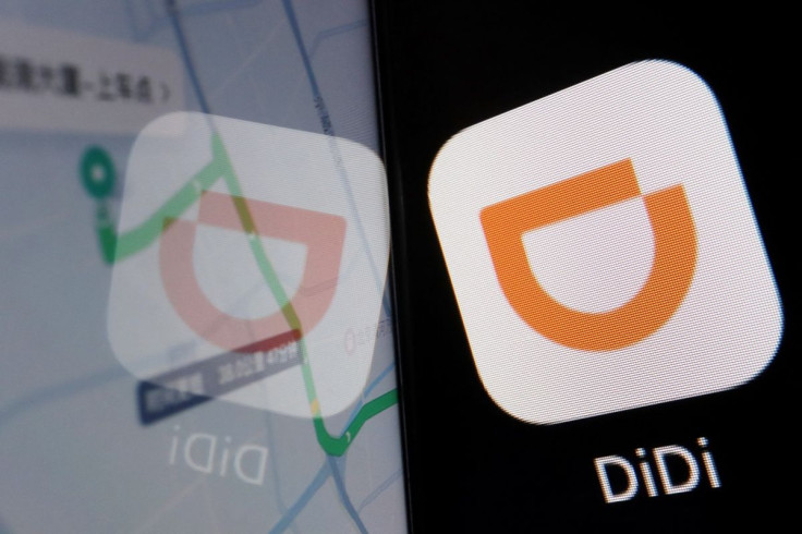 The app logo of Chinese ride-hailing giant Didi is seen reflected on its navigation map displayed on a mobile phone in this illustration picture taken July 1, 2021.