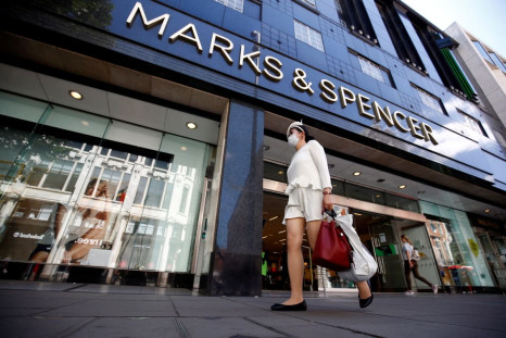 A woman walks past a Marks & Spencer store at Oxford Street in London, Britain, July 20, 2020. 