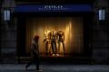 A man walks past Ralph Lauren Corp.'s flagship Polo store on Fifth Avenue in New York City, U.S., April 4, 2017.    