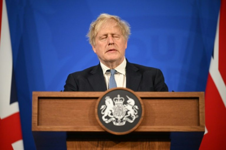 UK Prime Minister Boris Johnson apologised but defied calls to quit after a critical report into lockdown-breaking parties at his Downing Street office