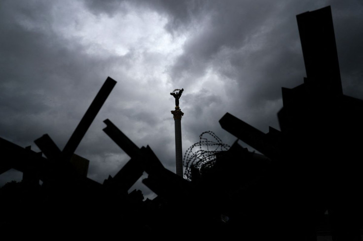 The Independence Monument is pictured through hedgehog anti-tank barricades, as Russia's attack on Ukraine continues, in Kyiv, Ukraine May 22, 2022. 