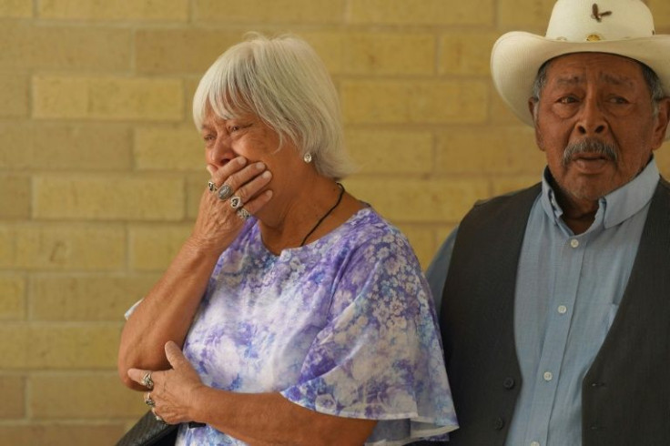 Catholic faithful leave mass at Sacred Heart Catholic church in Uvalde, Texas, a day after a deadly school shooting devastated the town