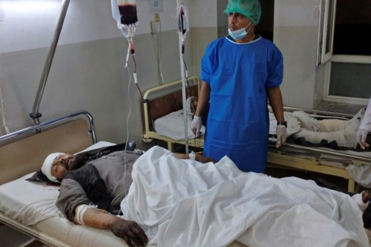 An injured bomb blast victim rests inside a hospital in Mazar-i-Sharif on May 25, 2022