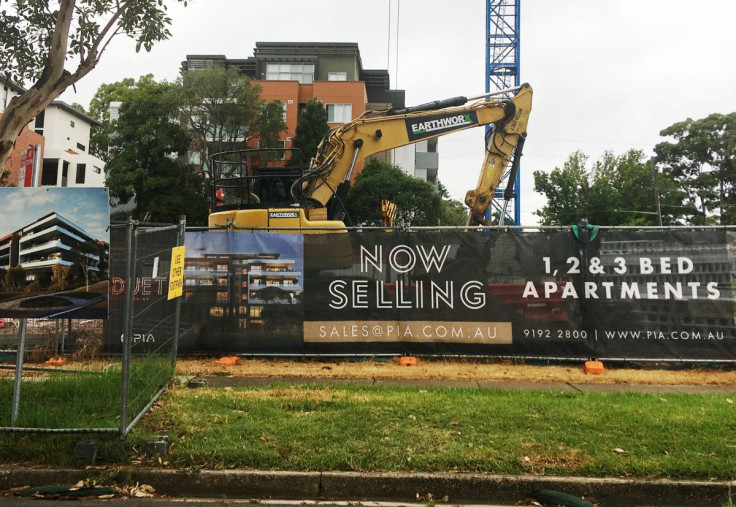 An excavator is parked at the construction site of an apartment block in the suburb of Epping, Sydney, Australia February 1, 2019.