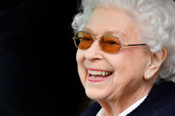 Britain's Queen Elizabeth reacts as she watches horses competing on the second day of the Royal Windsor Horse Show and Platinum Jubilee Celebration in Windsor, Britain, May 13, 2022. 