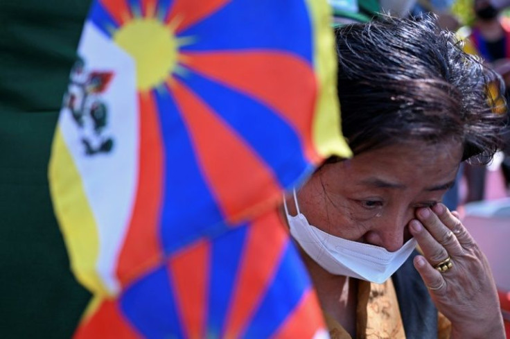 An exiled Tibetan takes part in a March 2022 rally in New Delhi as the United States raises concerns about China's human rights record