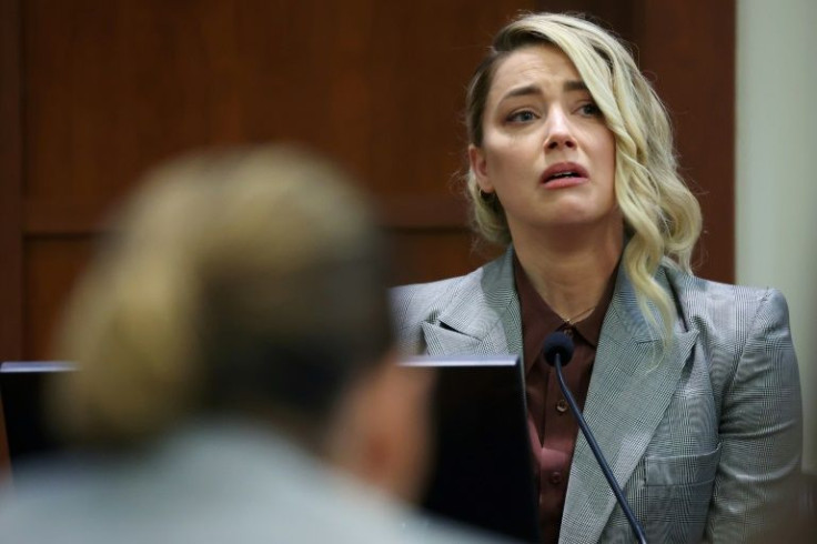 Amber Heard testifies during the defamation case filed against her by her former husband Johnny Depp