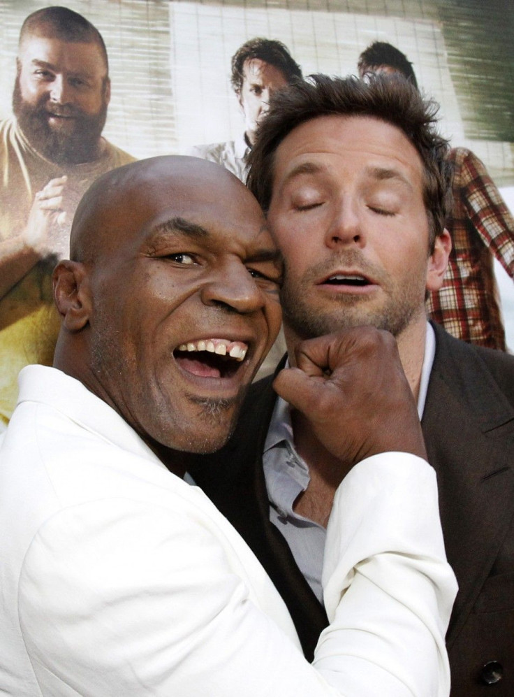 Mike Tyson (L) jokes with cast member Bradley Cooper at the premiere of &quot;The Hangover Part II&quot; at Grauman&#039;s Chinese theatre in Hollywood, California May 19, 2011.