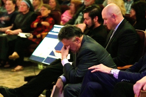 Former Columbine principal Frank DeAngelis cries as he is introduced at a Columbine 20th  anniversary remembrance service, held two days ahead of the anniversary of the school shooting, at Waterstone Community Church in Littleton, Colorado, U.S. April 18,