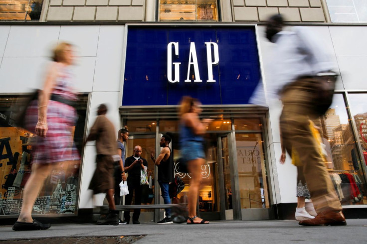 People pass by the GAP clothing retail store in Manhattan, New York, U.S., August 15, 2016.