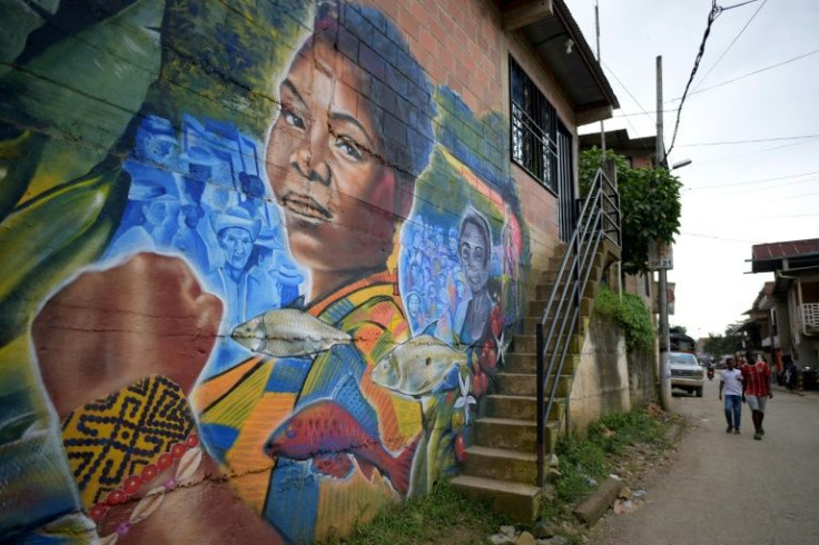 Francia Marquez, depicted here in a mural, could become Colombia's first-ever black, woman vice president