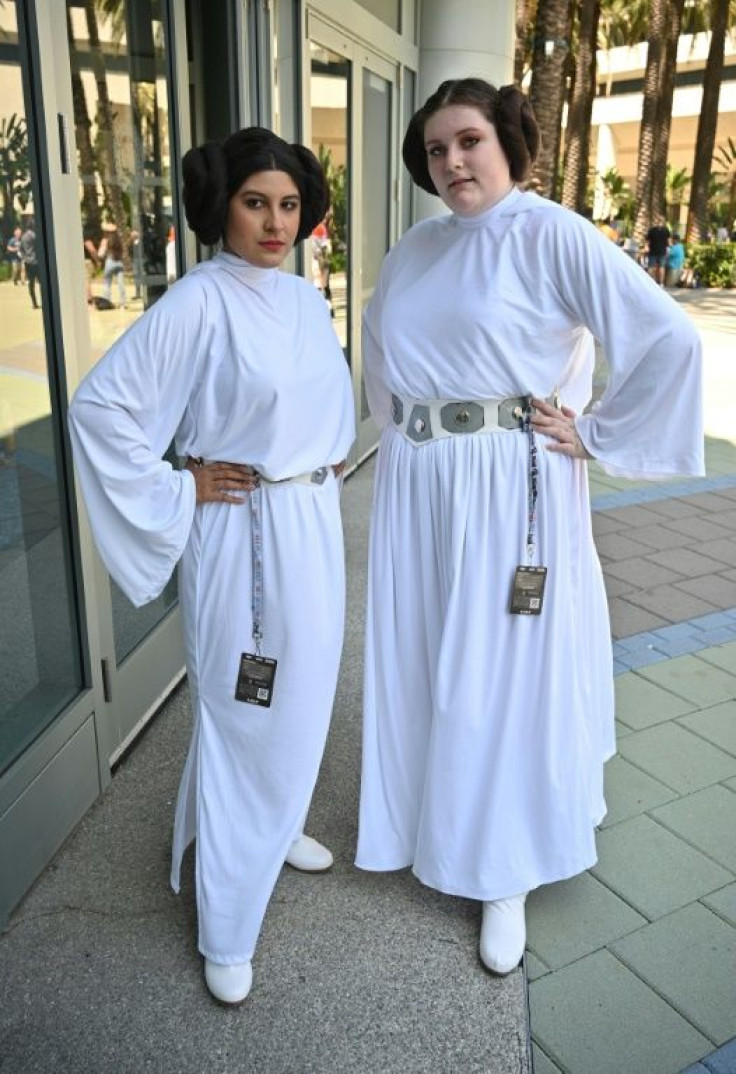 Fans Karla Flores (L) and Lily Logan (R) attend the first day of "Star Wars Celebration" as Princess Leia