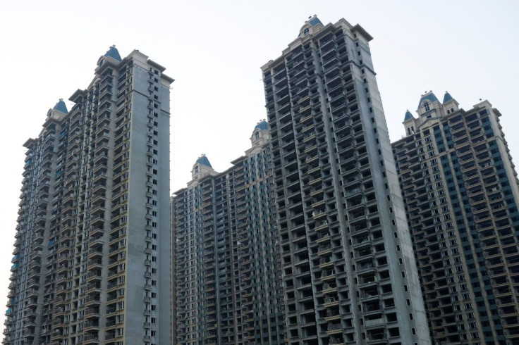 Unfinished residential buildings are pictured at the Evergrande Oasis, a housing complex developed by Evergrande Group, in Luoyang, China September 15, 2021. Picture taken September 15, 2021.
