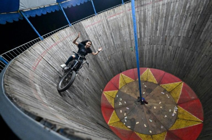 For decades, the Satan's Barrel -- or "Tong Setan" -- has been the main attraction at travelling funfairs in Indonesia, particularly in rural areas