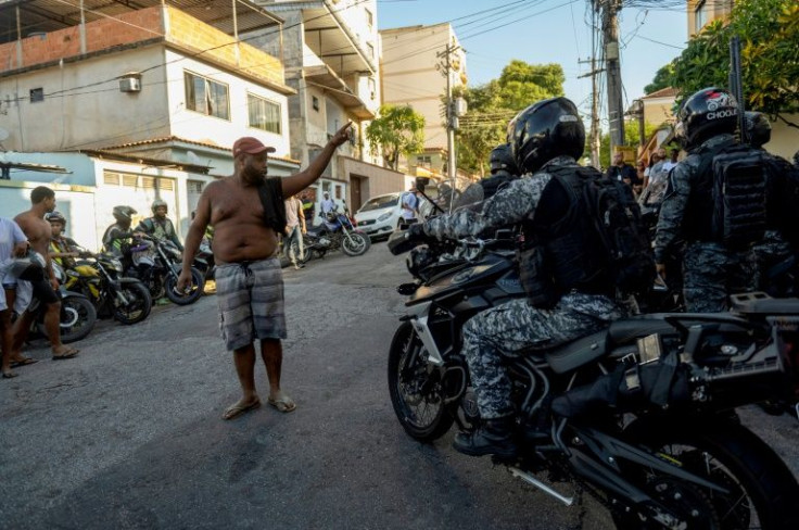 Police say they encountered gunfire during the raid on Vila Cruzeiro, but senior rights lawyer Rodrigo Mondego said he suspects 'a large number of summary executions.'