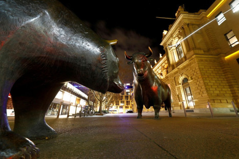 Bull and bear symbols for successful and bad trading are seen in front of the German stock exchange (Deutsche Boerse) in Frankfurt, Germany, February 12, 2019.  