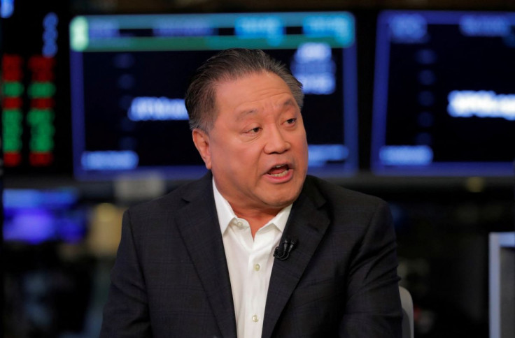 Hock Tan, CEO of Broadcom, speaks on the floor of the New York Stock Exchange shortly before the opening bell in New York, U.S., February 12, 2018. 