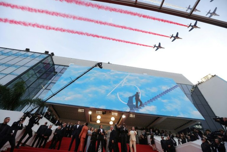 The decision to send the French Air Force display team roaring over the red carpet was considered in  bad taste