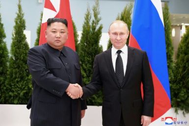 North Korean leader Kim Jong Un meets in 2019 in Vladivostok with President Vladimir Putin of Russia, whose banks have been targeted by US sanctions over support to Pyongyang's missile program
