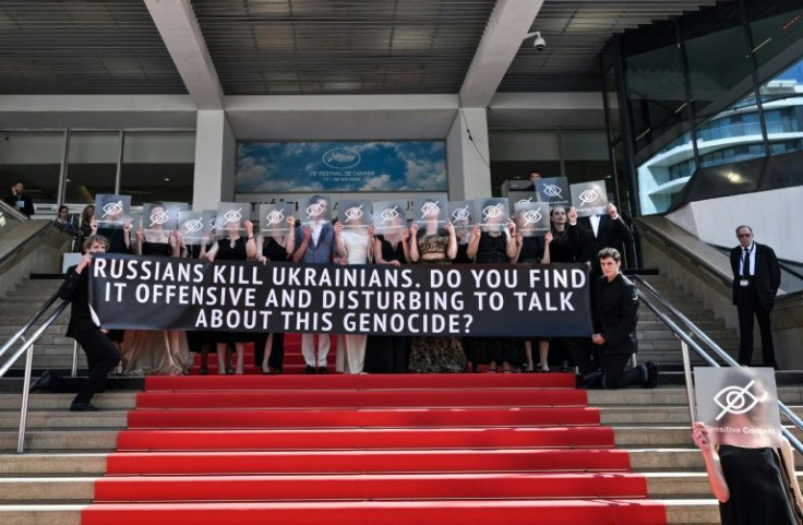 A protest on the red carpet ahead of a special screening of Ukrainian film 'Butterfly Vision'