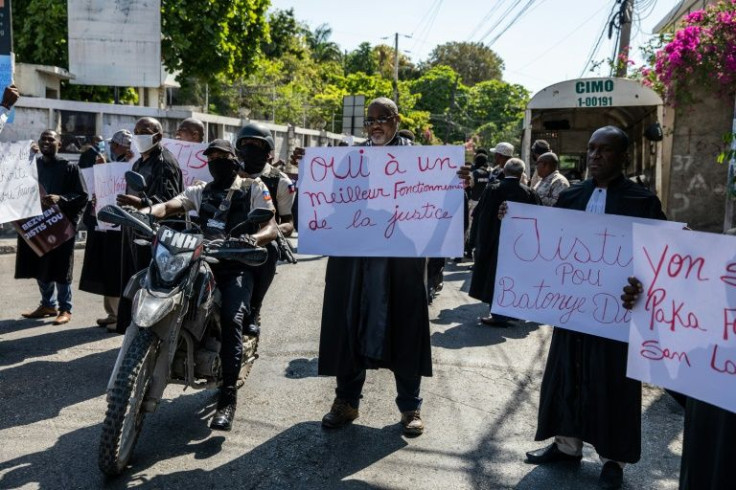 Lawyers protest outside of Prime Minister Ariel Henryâs private home to force the government to relocate the civil court to a safer area of Port-au-Prince, in April 2022, amid rising gang violence in the capital