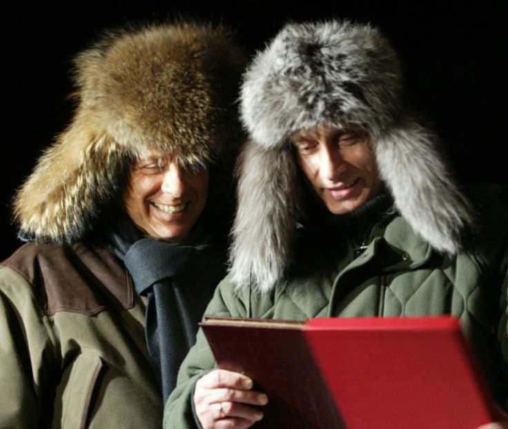Berlusconi was an admirer and friend of Putin -- they stayed in each other's holiday homes, skied together and were snapped sporting giant fur hats