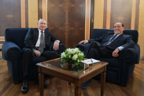 Russian President Vladimir Putin with former Italian prime minister Silvio Berlusconi in Rome in 2019