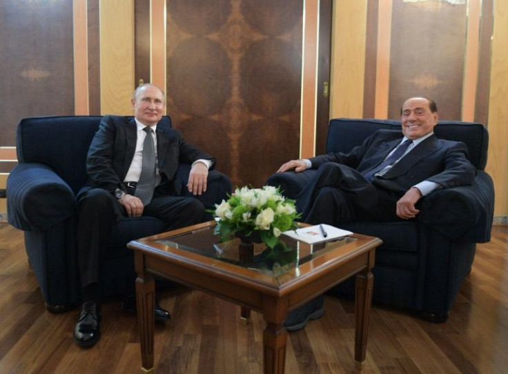 Russian President Vladimir Putin with former Italian prime minister Silvio Berlusconi in Rome in 2019