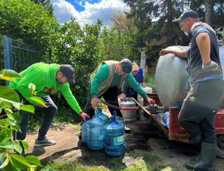 Vlad, 35, a tractor driver, says the shelter's residents 'had to fetch water from the well' before