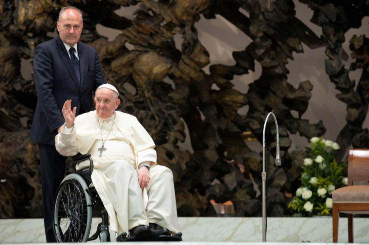 Pope Francis waves to members of the apostolic movement of the Roman Catholic Church "Cursillos in Christianity" at the Vatican, May 28, 2022. Vatican Media/Handout via REUTERS