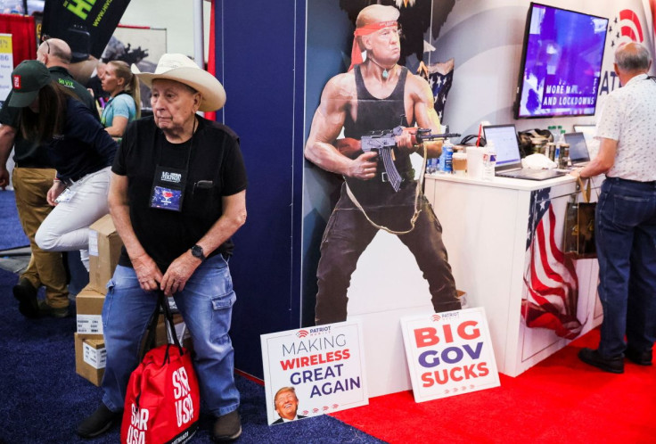 People attend the National Rifle Association (NRA) annual convention in Houston, Texas, U.S. May 28, 2022. 